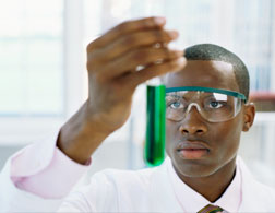 Student in a science lab. Click image to expand.