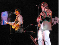 John and Paul share the stage again, thanks to the magic of Beatles haircuts