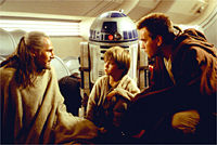 Neeson, R2-D2, Lloyd, and McGregor