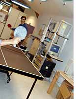 Lou Montulli plays pingpong during a power outage