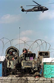U.S. troops guard their checkpoint in Brcko