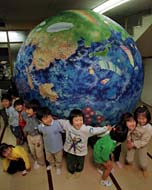 Kyoto kids display a tie-dye planet of life
