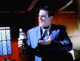 Diet Coke drinker with the beverage