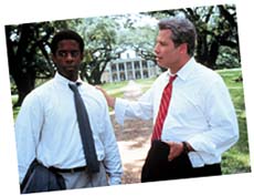 Henry Burton (Adrian Lester) and Gov. Jack Stanton (John Travolta)