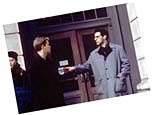 Damon and Turturro in Rounders