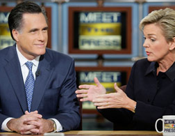 Mitt Romney with Michigan Gov. Jennifer Granholm. Click image to expand.