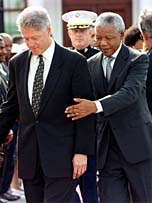 Clinton with South Africa's Nelson Mandela