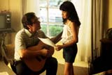 Abraham Quintanilla (Edward James Olmos) and young Selena (Becky Lee Meza)