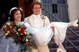 Courtney Love (Althea) and Woody Harrelson (Flynt)