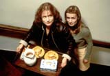 Isabelle Huppert (Jeanne) and Sandrine Bonnaire (Sophie)