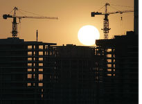 Construction cranes in Beijing. Click image to expand.