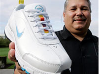 Sam McCracken of Nike shows the new Nike Air Native N7 shoe
Click image to expand.