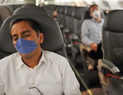 Masks on a plane. Click to expand.
