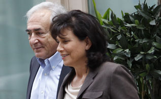 Former IMF chief Dominique Strauss-Kahn and his wife Anne Sinclair. Click image to expand.